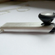 Image for article titled Precious Metal Cover Makes Jewelry of Apple Bluetooth Headset